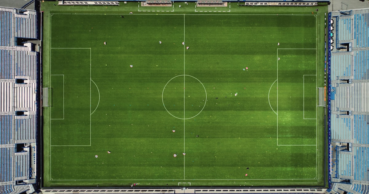 Aerial view of a green stadium pitch — World Cup 2026 pitch quality